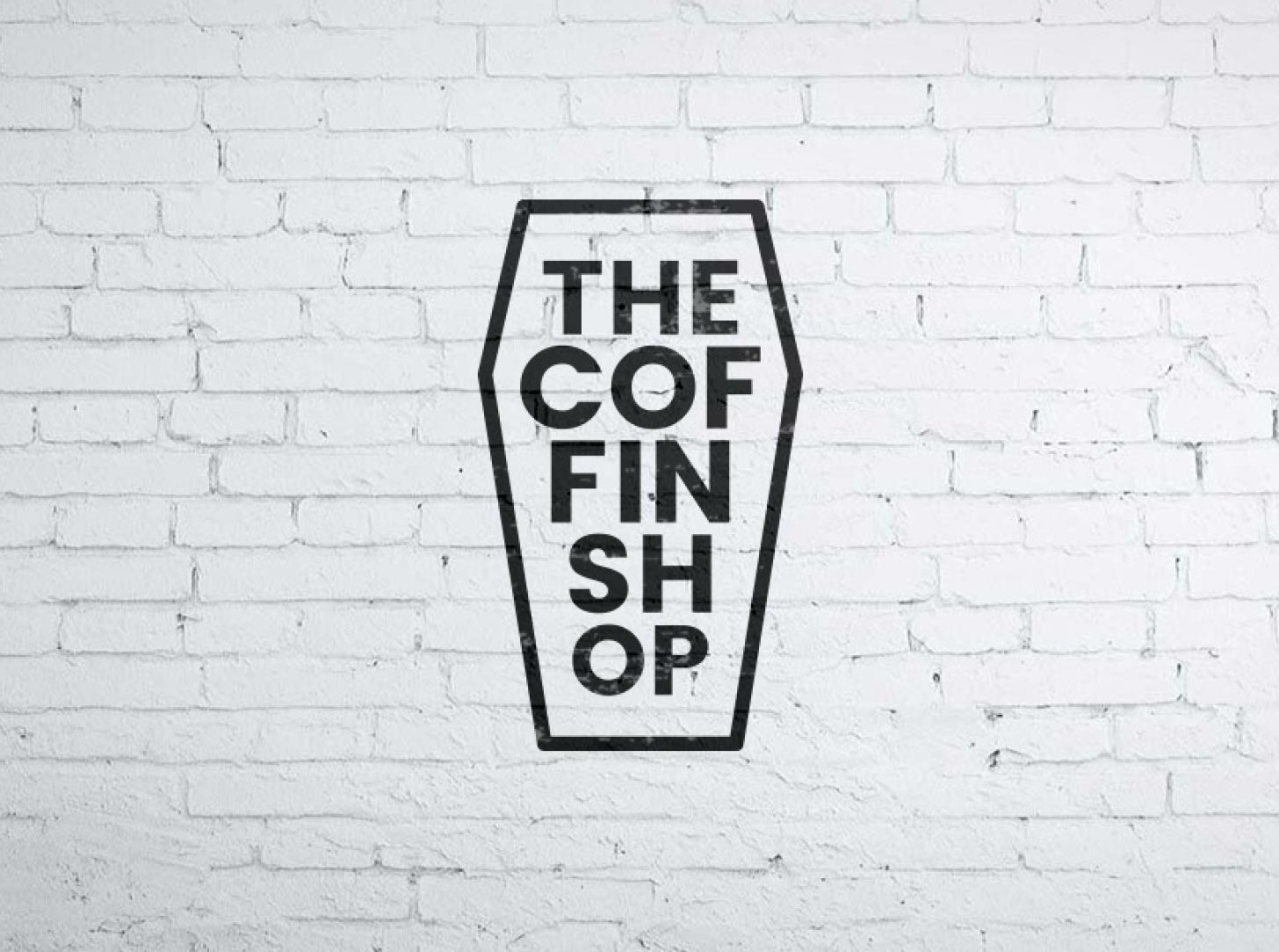 creative-logo-design-the-coffin-shop-on-brick-wall-rev